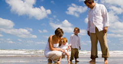 Family with children at the beach